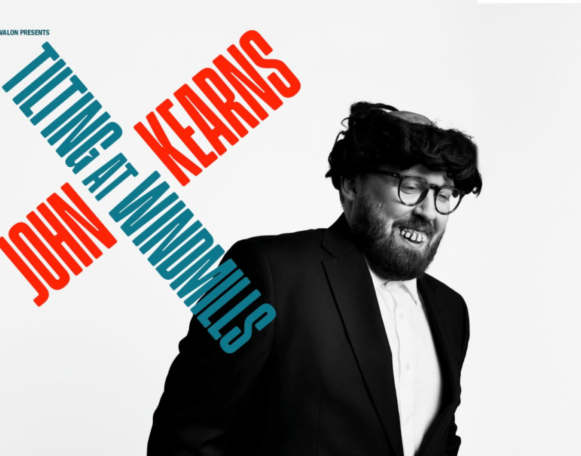 Comedian John Kearns in a wig and false teeth