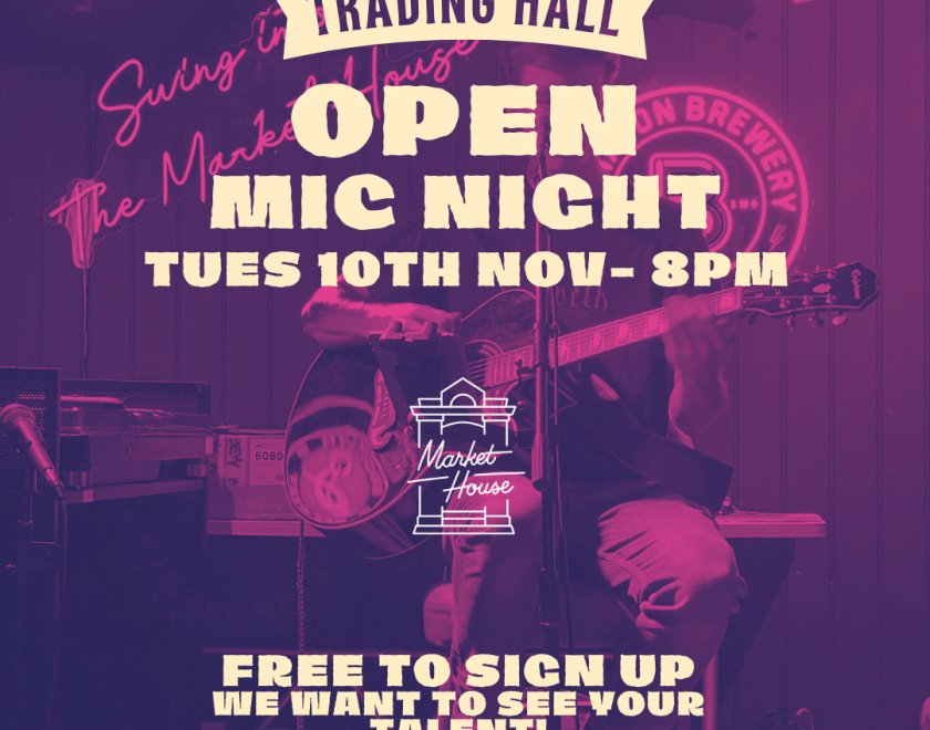 Pink and purple Market House poster featuring a live guitarist, promoting open mic night on Tuesday 10 November at 8pm, with free sign-up for performers.