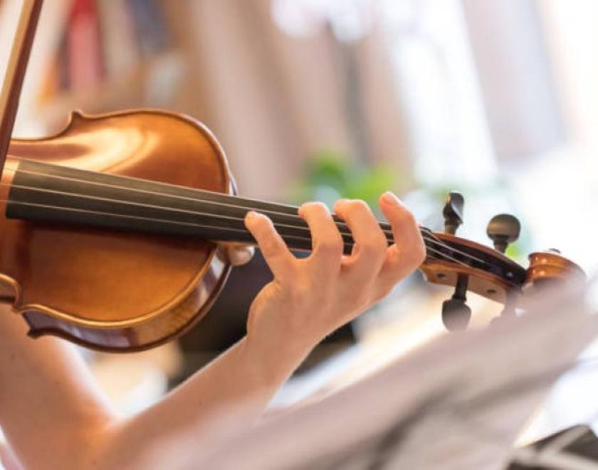 student playing violin